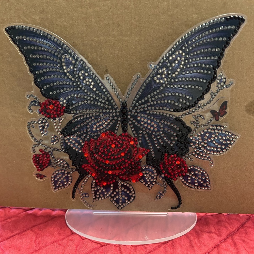 Decorative Butterfly and Rose Accent.      The Rare One